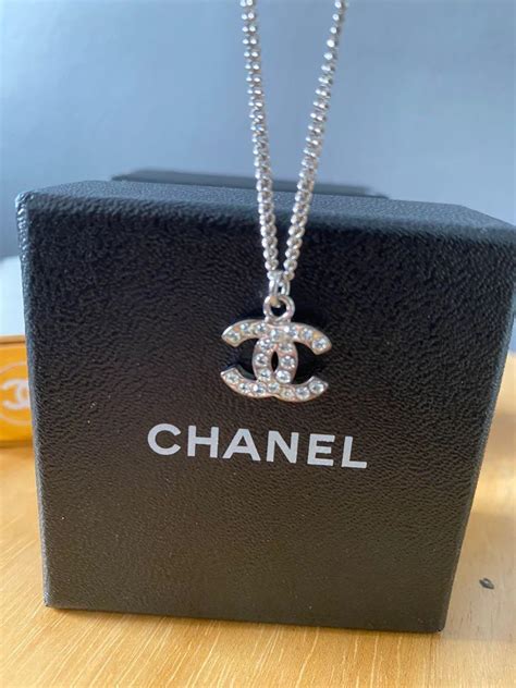 chanel collier necklace|Chanel ring necklace.